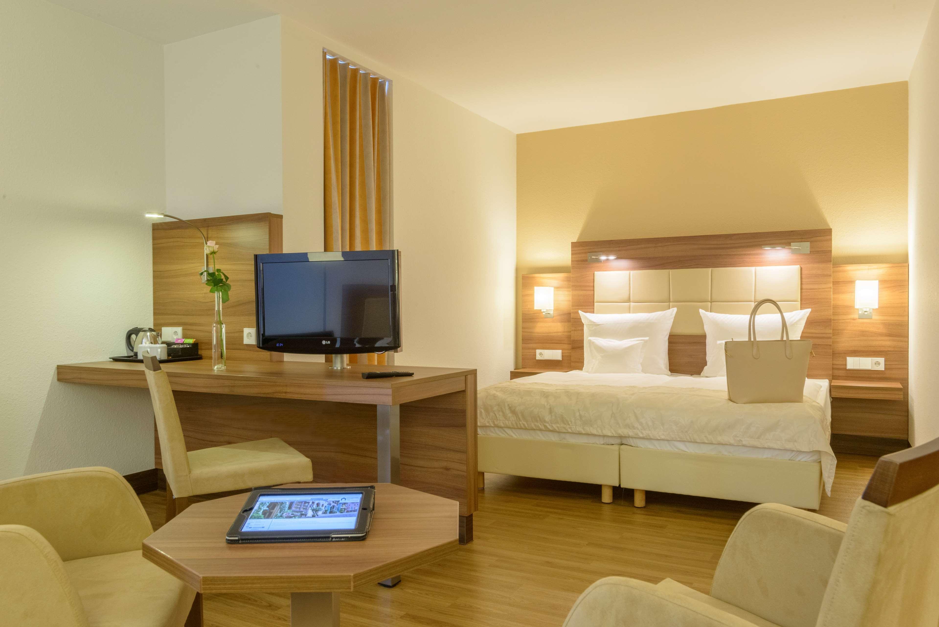 Best Western Plus Hotel Am Schlossberg Нюртинген Экстерьер фото